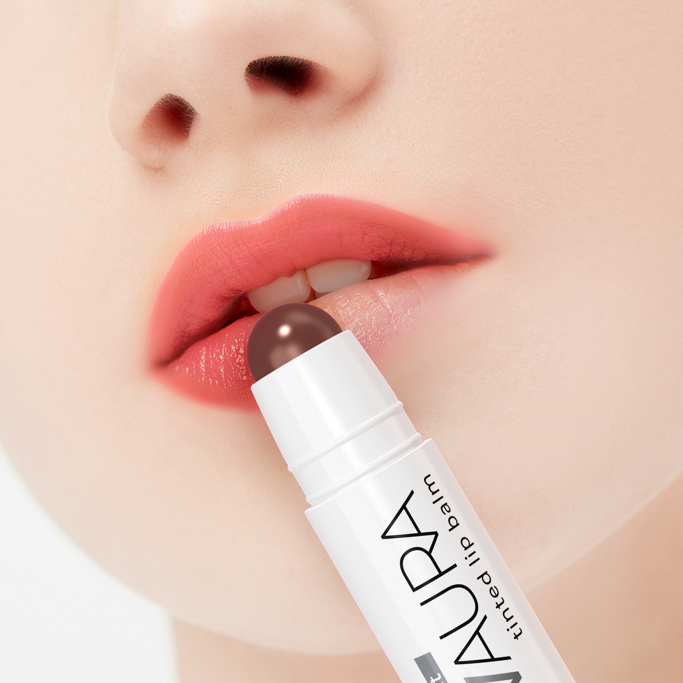 Lip balm being applied to lips with a close-up of the product