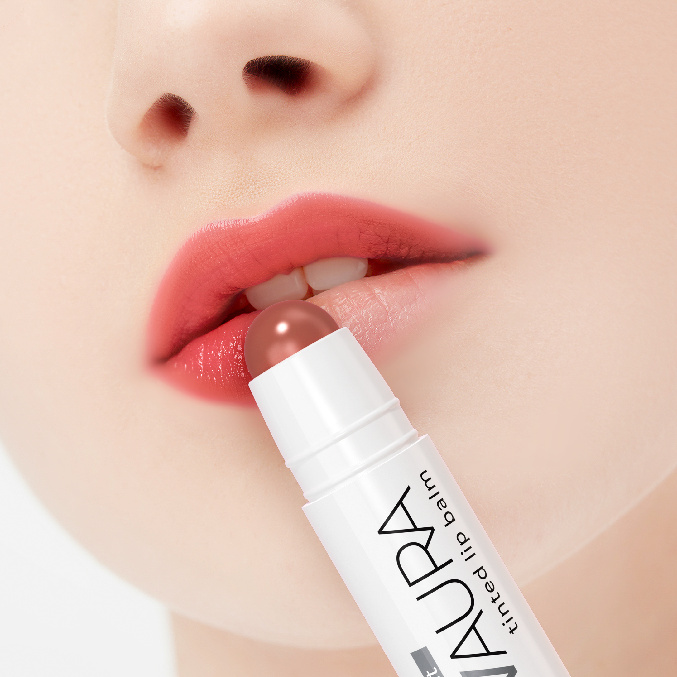 Lip balm being applied to lips with a blurred background
