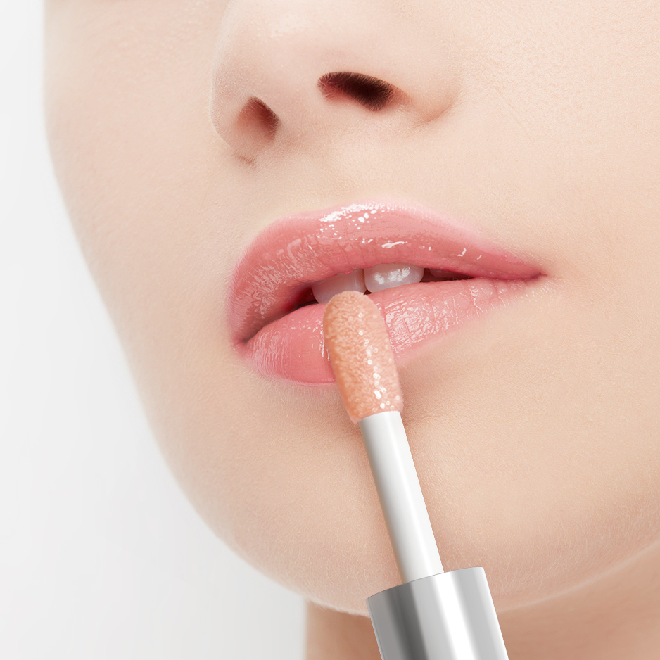 Close-up of a person applying lip gloss with a brush on a light background
