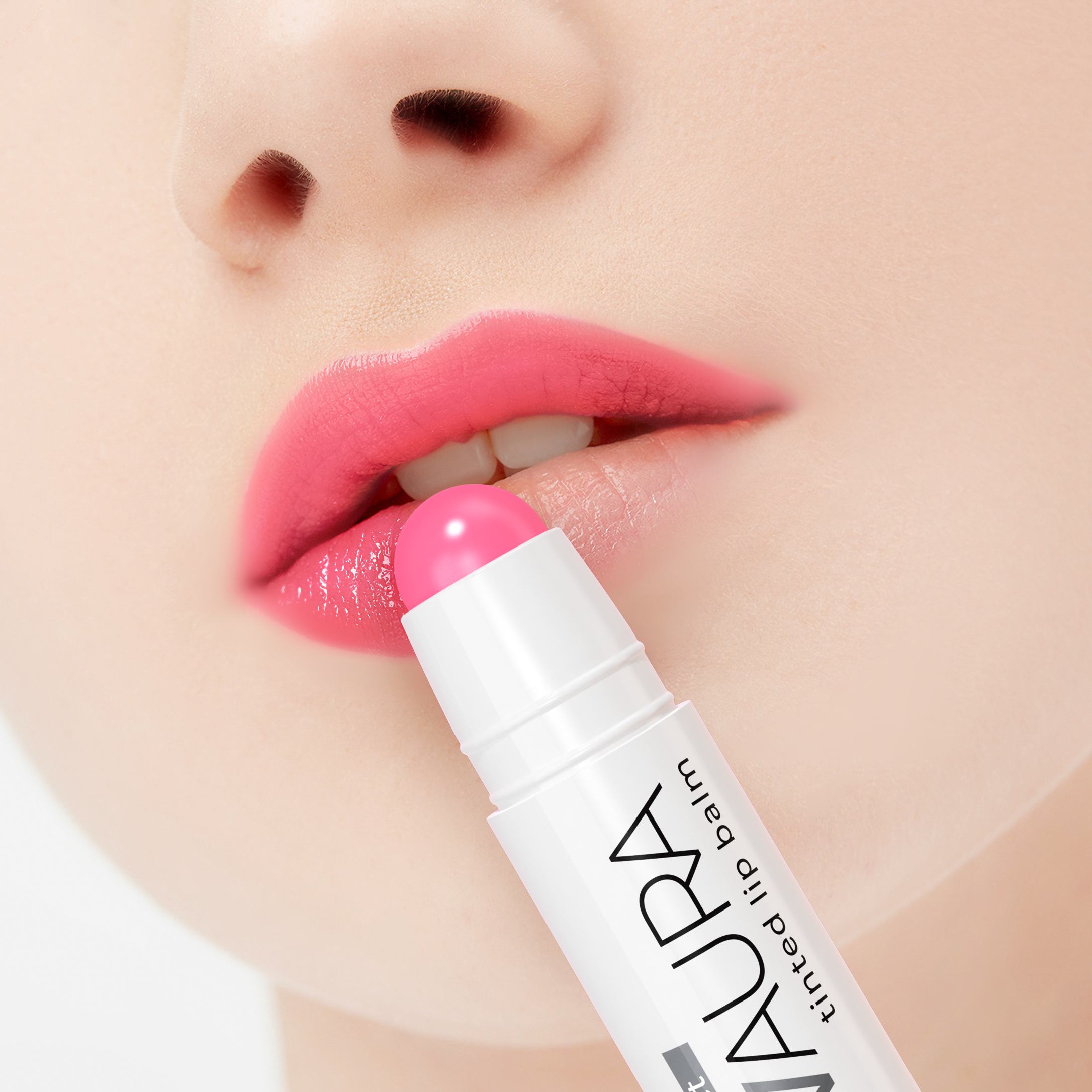 Lip balm with 'Laura' branding applied to lips on a white background