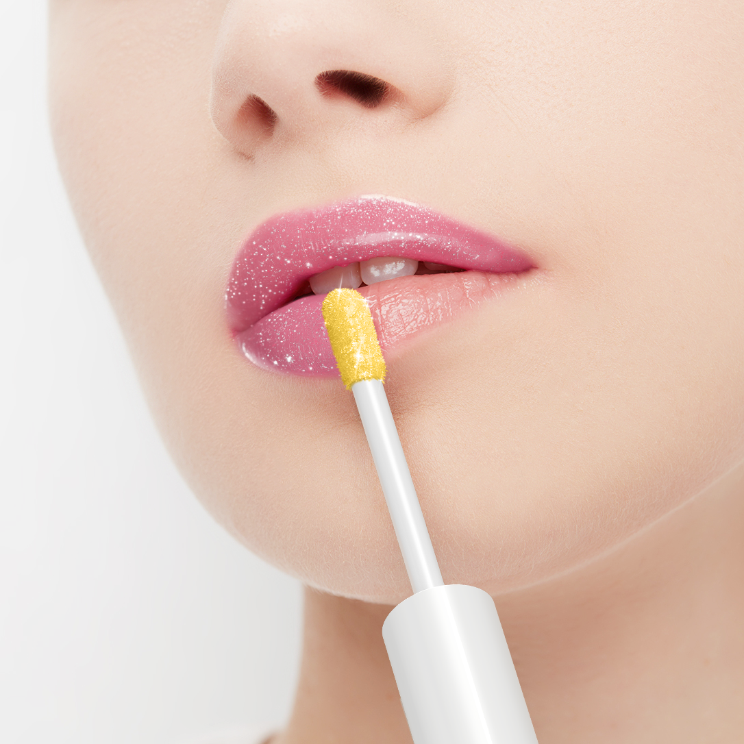 Close-up of a person applying lip gloss with a applicator on a white background