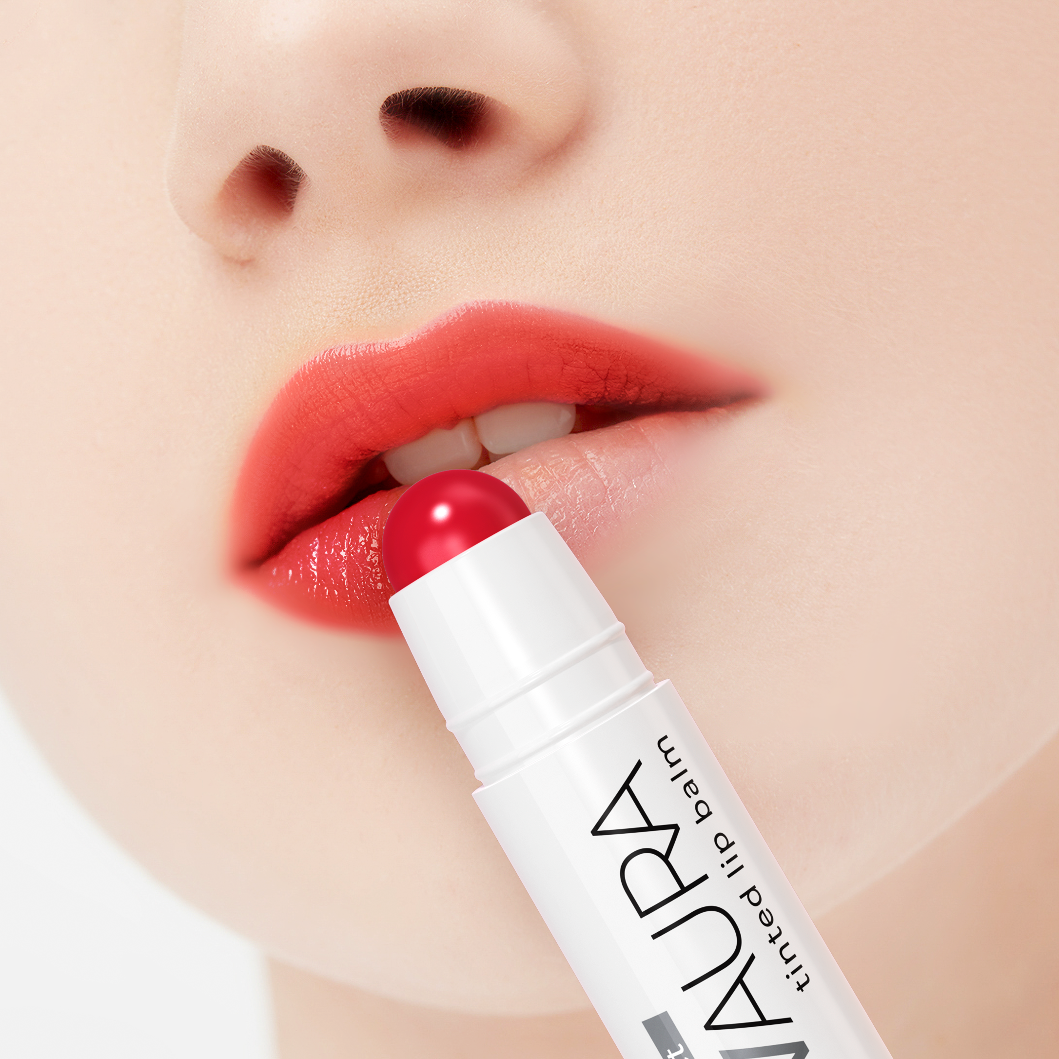 Lipstick being applied to lips with a close-up of the brand name 'Laura' on the lipstick.