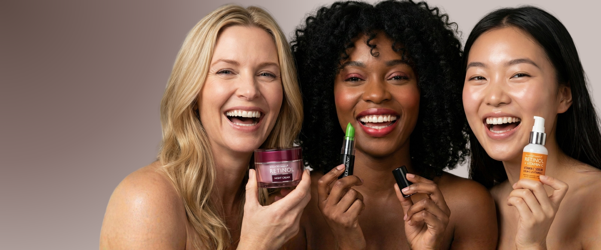 Three women holding skincare products against a neutral background